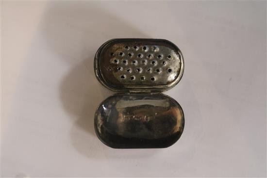 A George III bright cut engraved silver oval nutmeg grater, with hinged steel rasp, by Joseph Wilmore, 37mm.
